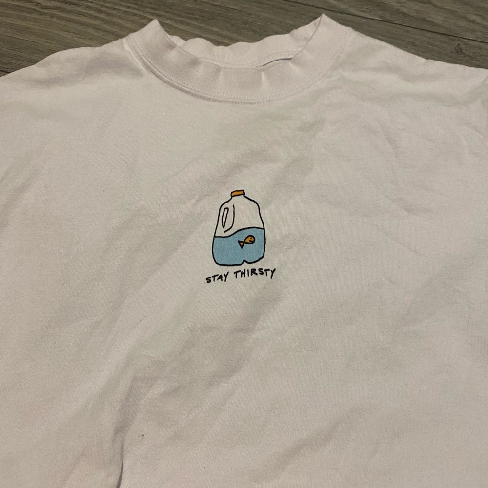 White Graphic Tee with Water Jug Design